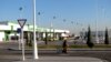 Turkmenistan weekly, Ashgabat airport a woman walking with her suitcase